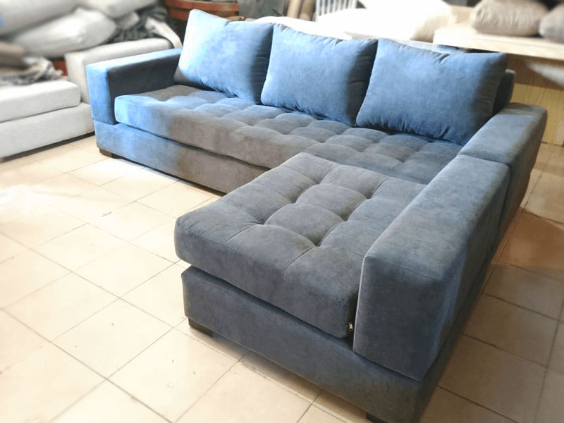 Esquinero Sofá modular tapizado estilo capitoné color azul acero